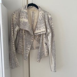 Georgie, Small motorcycle jacket, white snake skin